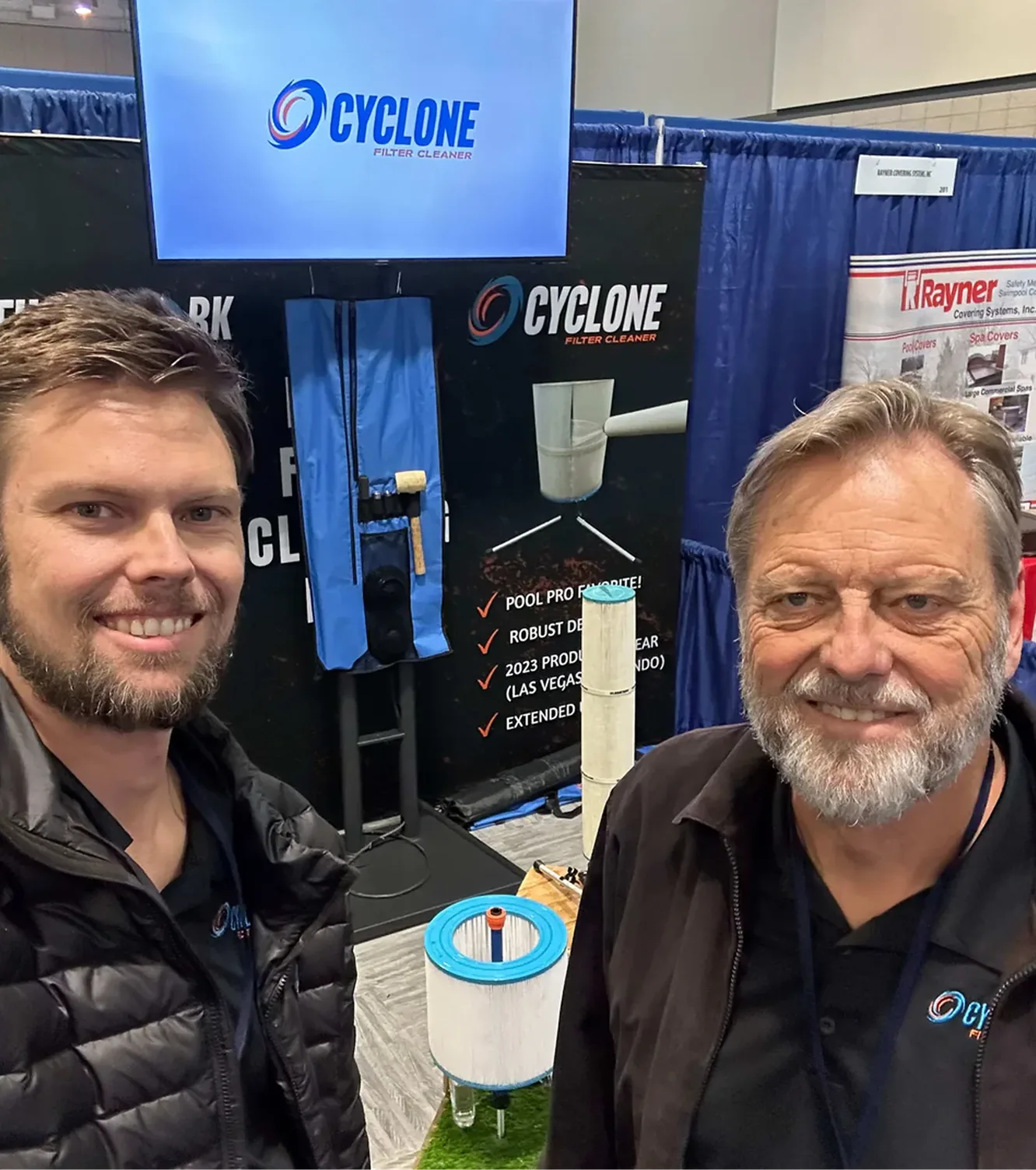 Cyclone founders at a trade show booth
